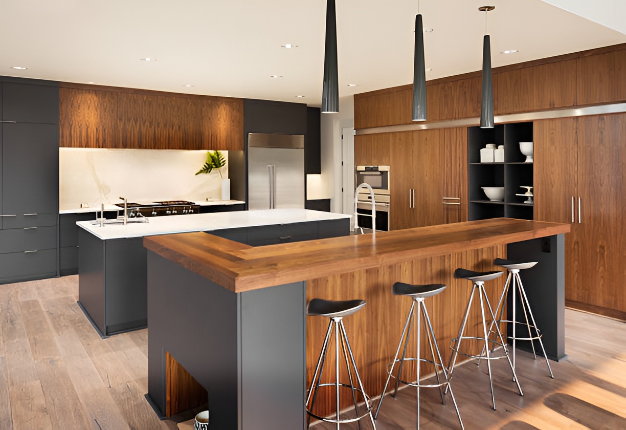 modern kitchen with black countertops and wood cabinets